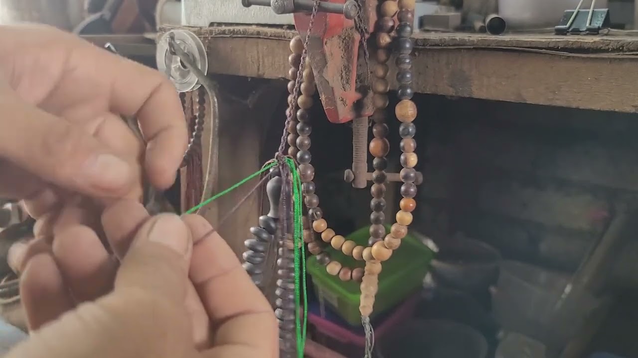 Ikatan tasbih buah tijani sulam.
