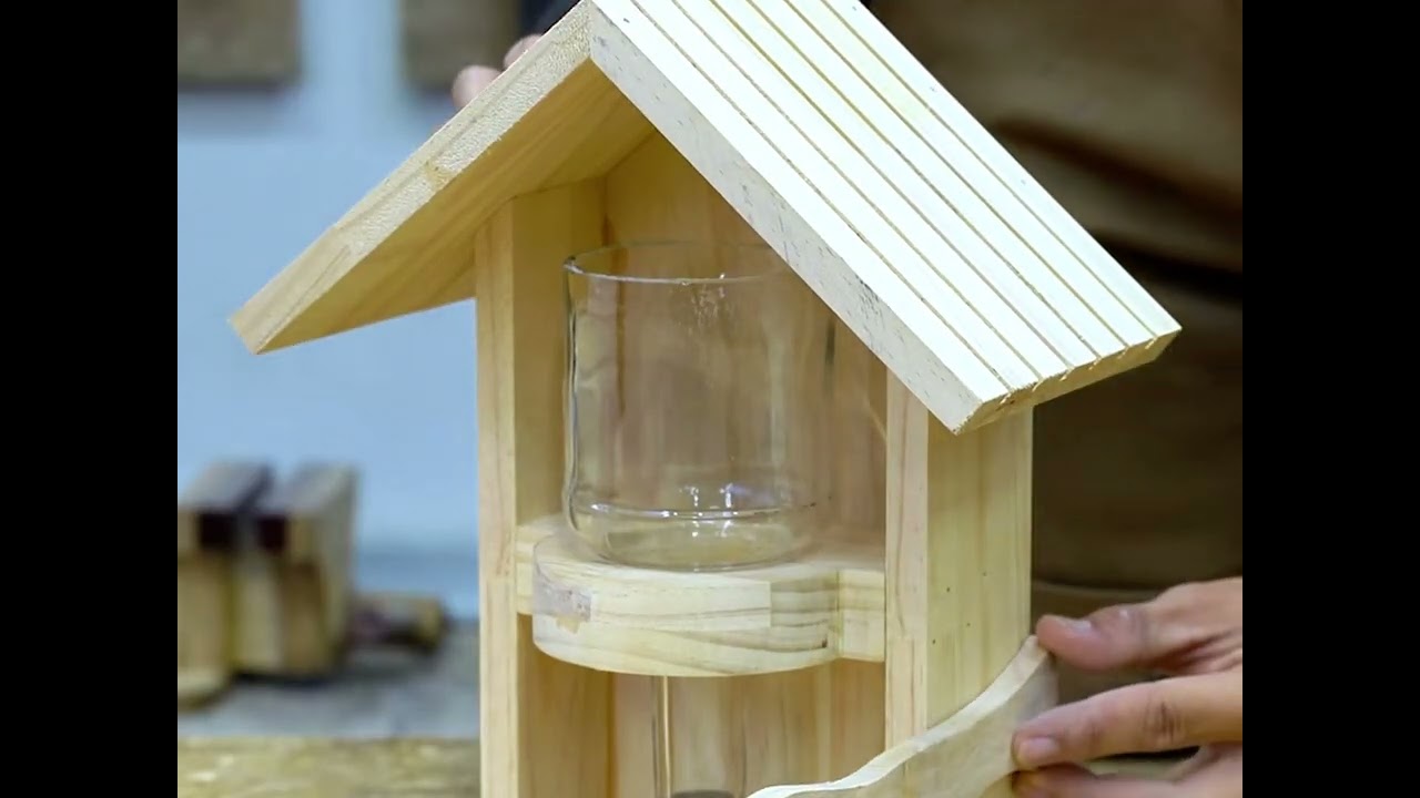 Simple wood + creative idea= beautiful bird feeder! Would you try this at home?