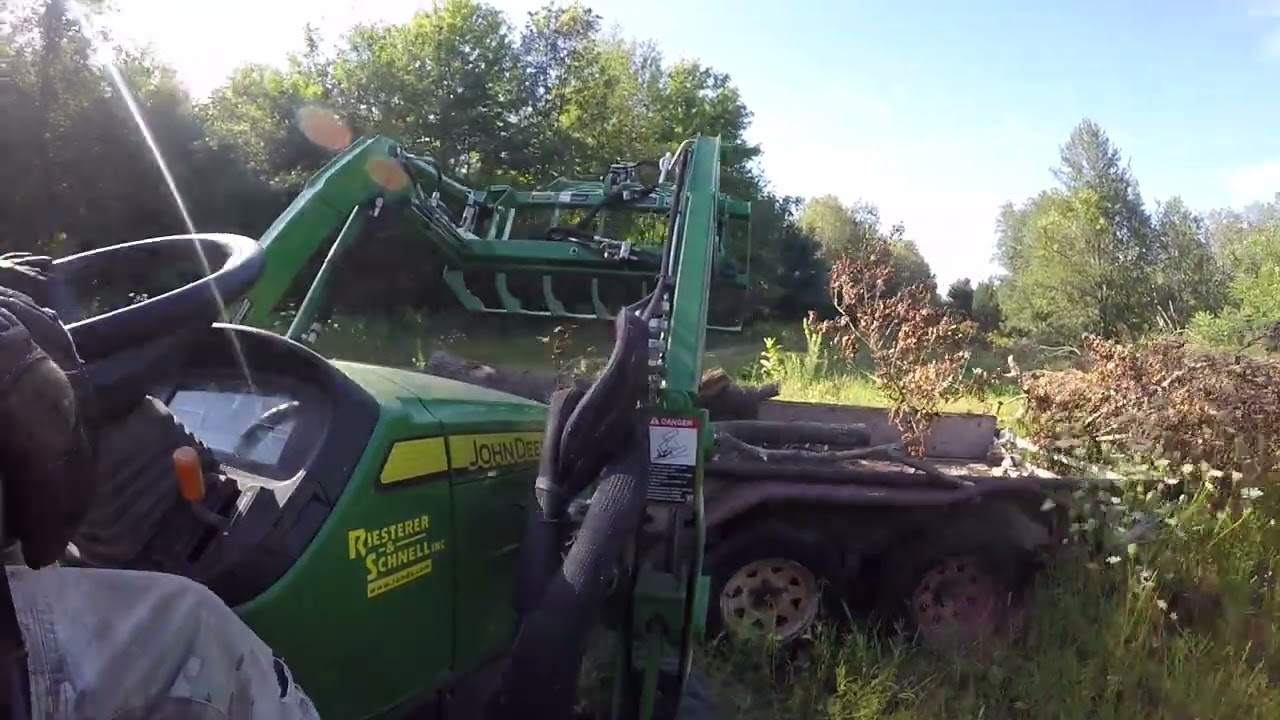 Moving Logs for cutting and splitting for firewood.