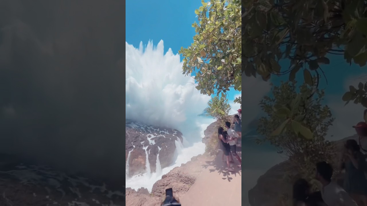 Massive wave breaks on billabong kelingking beach 