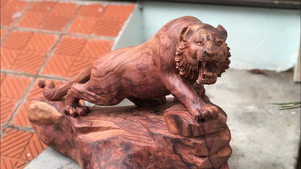 Beautiful wooden tiger carvings | TUAN WOOD CARVINGS