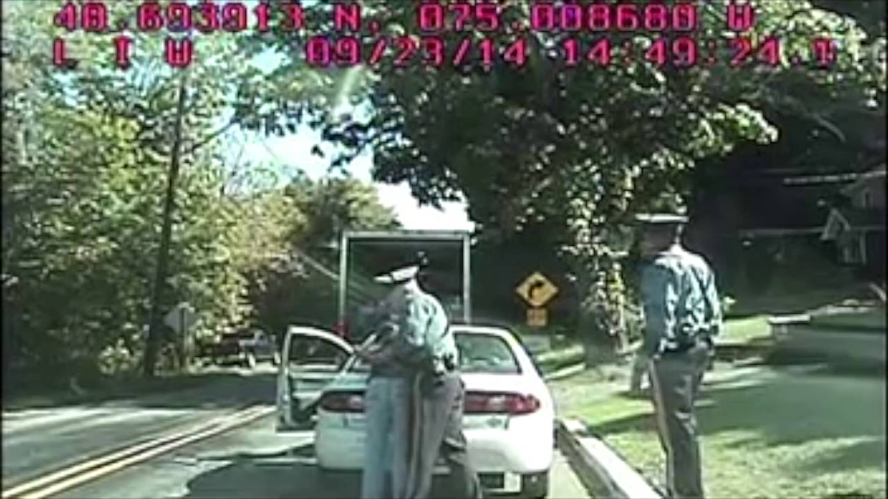 NJ troopers smash woman's window