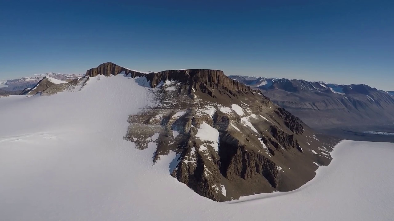 Helicopter flight from Mt JJ Thomson to Mt Cerberus, Dry Valleys, Antarctica