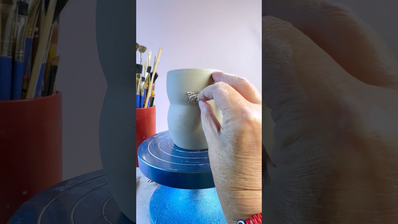 Making a rabbit vase nipping out.#ceramic#pottery #wheelthrown#clay#clayart #easterbunny#ceramicvase