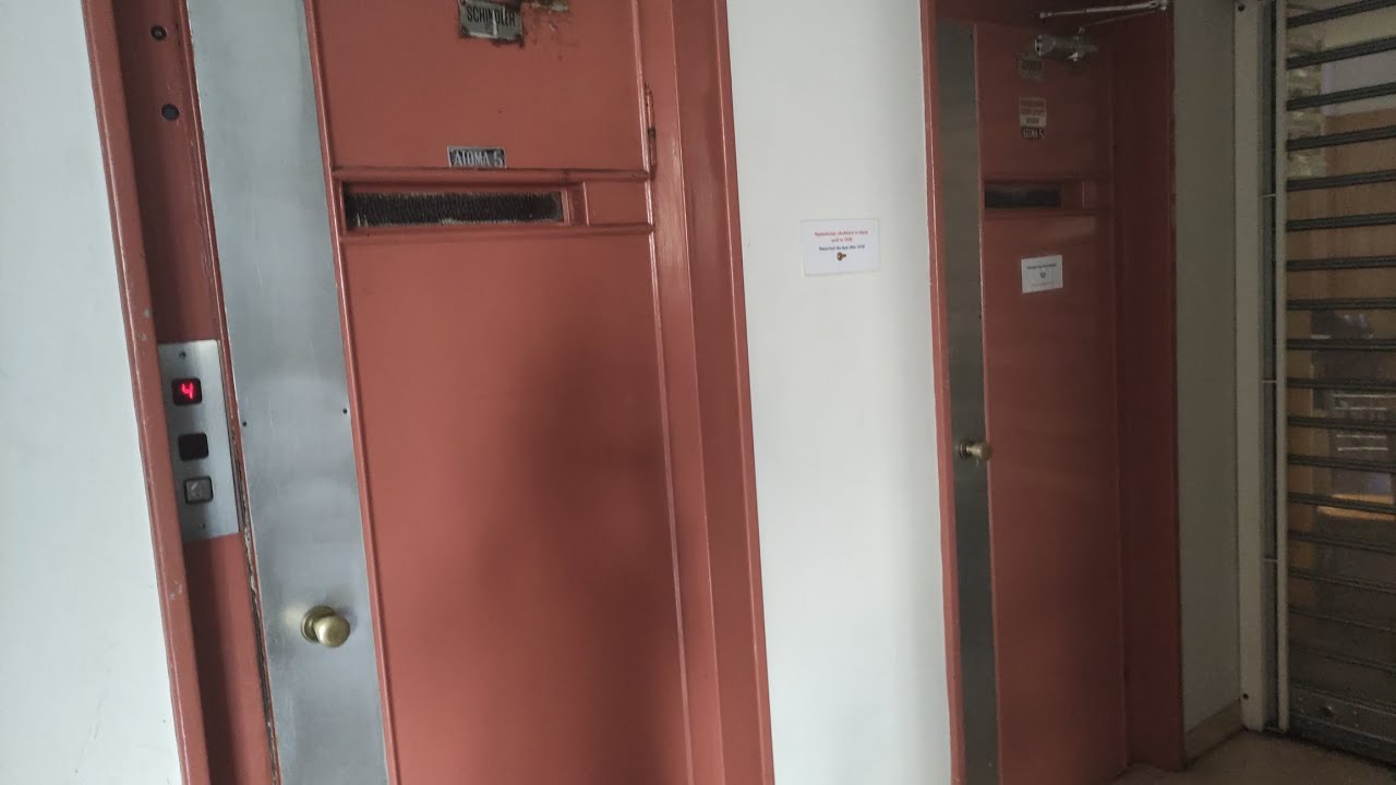 2 Old Schindler traction fast elevators (left elevator mod by: generic) in medical offices on Athens