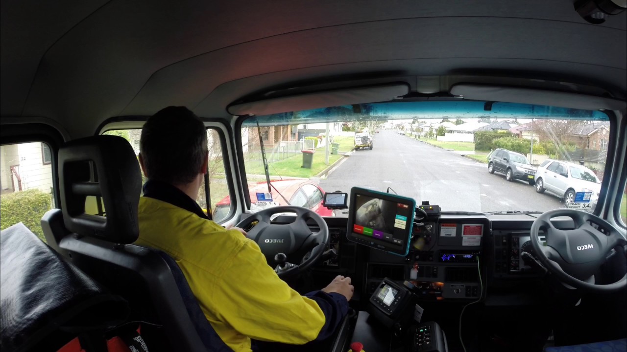 IVECCO/SUPERIOR PAK in cab view picking up bins