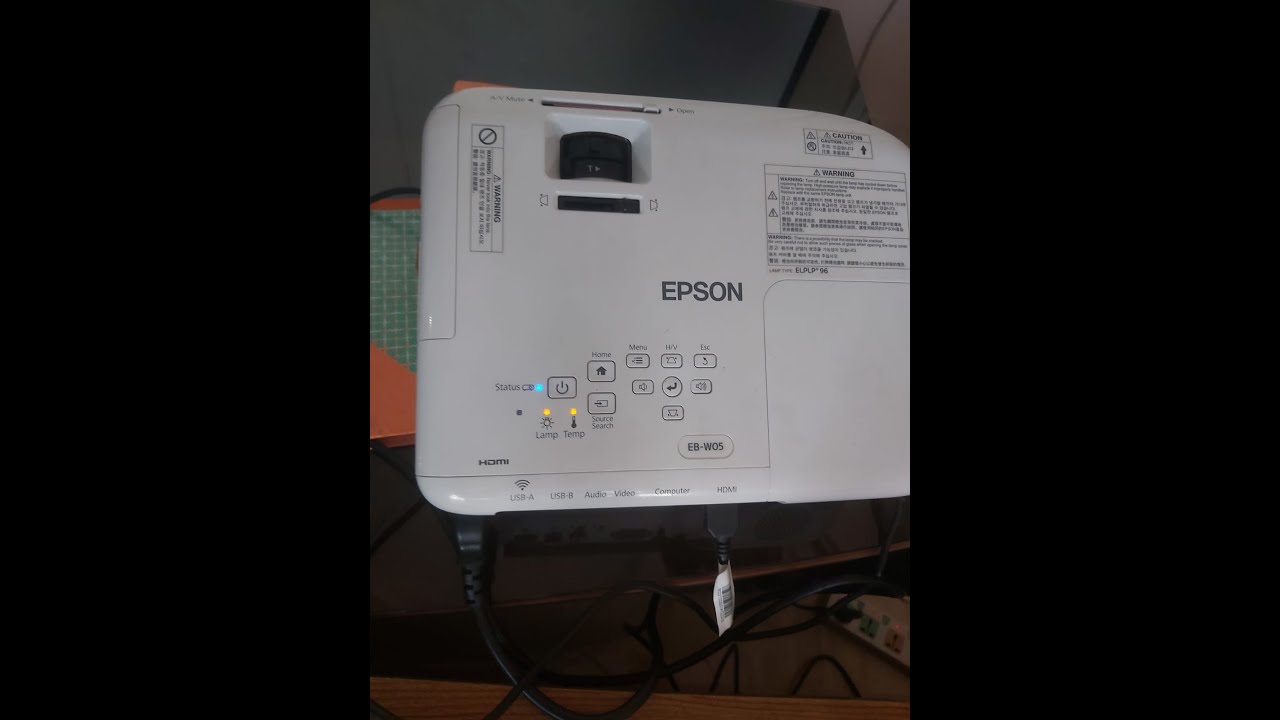 epson projector lamp and temp light flashing.