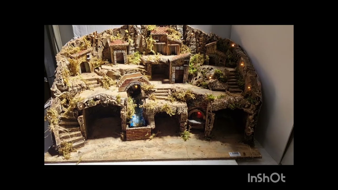 Presepe con cascata,fuoco,luci case e luce capanna da completare con statuine