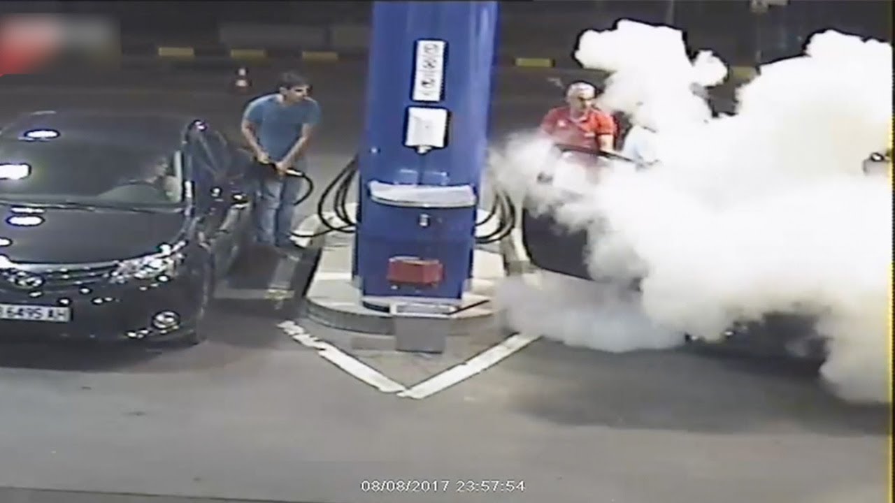 Gas pump worker douses cigarette and stubborn smoker with fire extinguisher