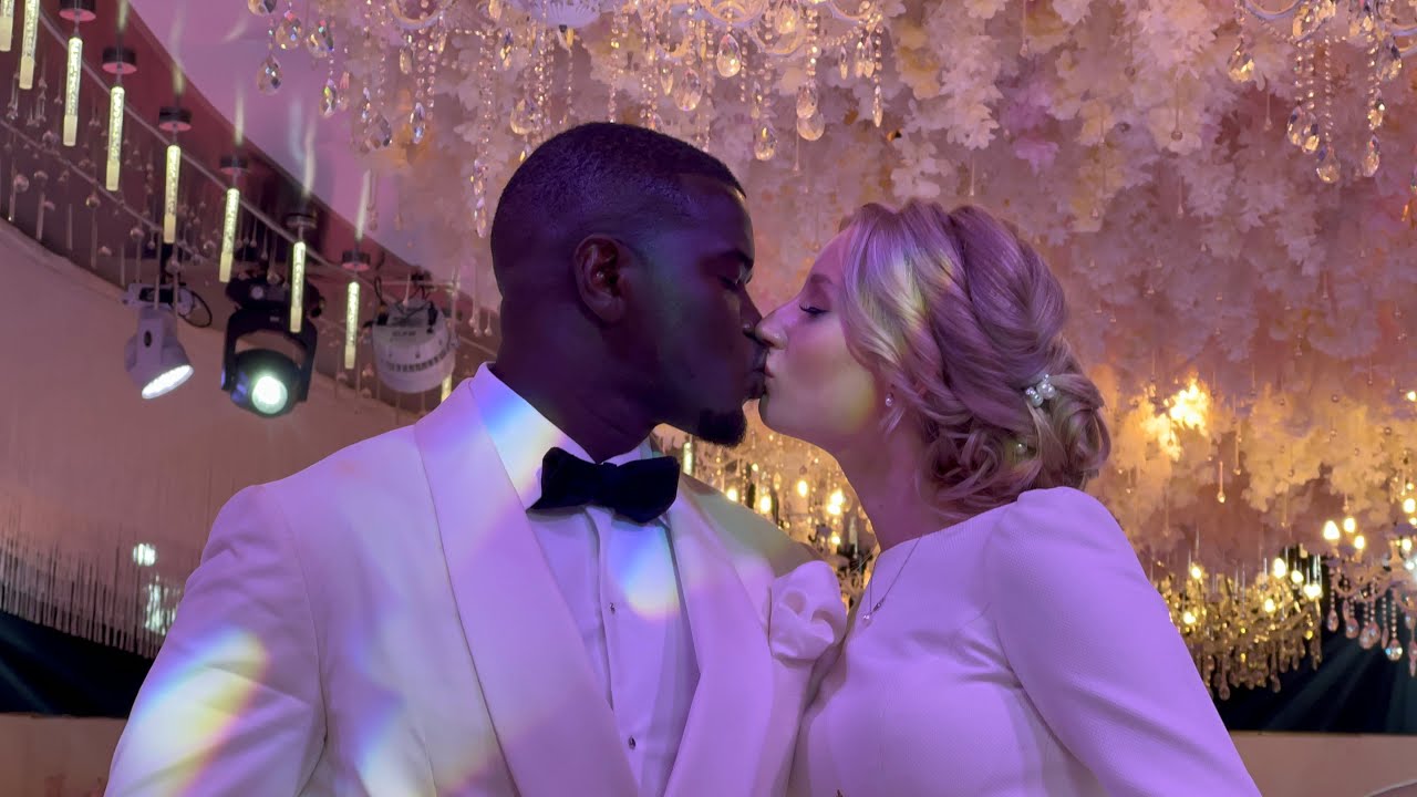 Robert Kayanja Jr. Defies odds as He Kisses his Muzungu Bride in Church.