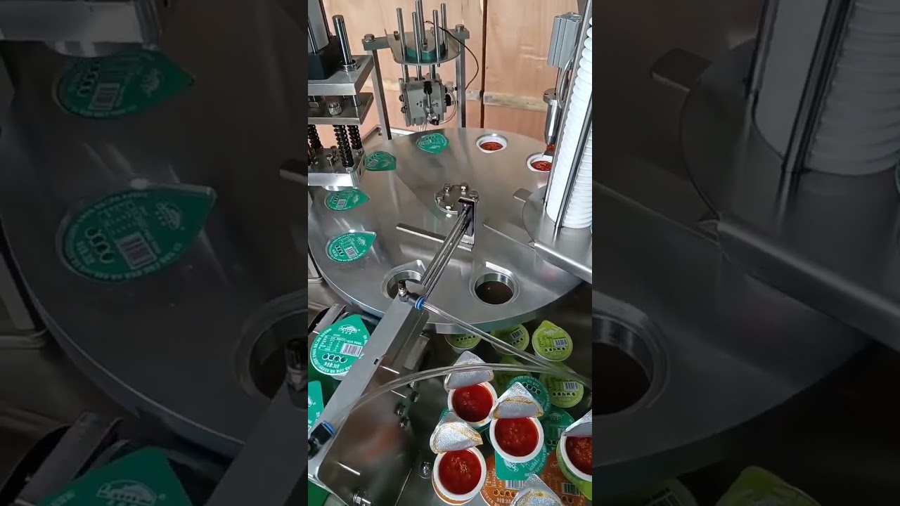 Mesin pengisian dan penyegelan cangkir saus pasta putar otomatis