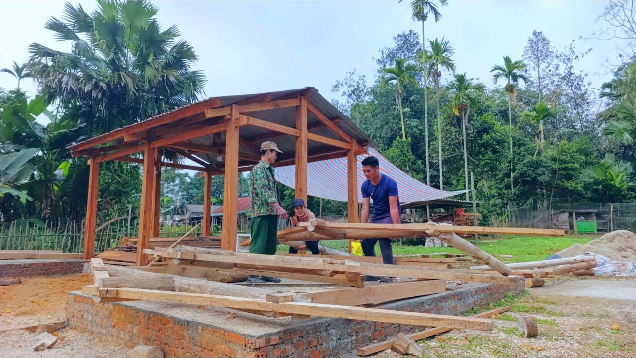 CUONG & LAN and their neighbor completed the entire house frame on a warm winter afternoon.
