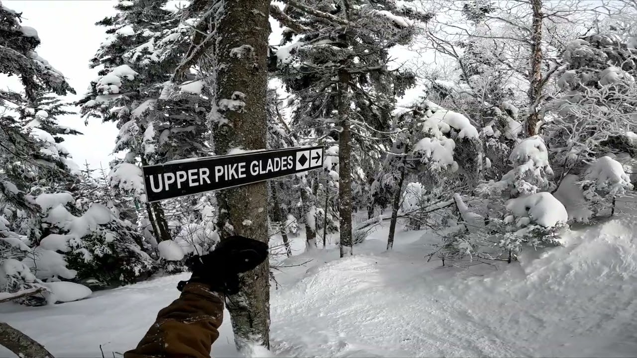 Skiing an unmarked steep glade into a long tree run at Pico!