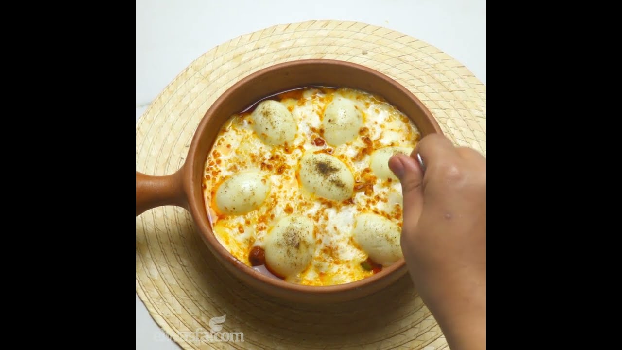 طاجن فول بالبيض و الجبنة الموتزاريلا