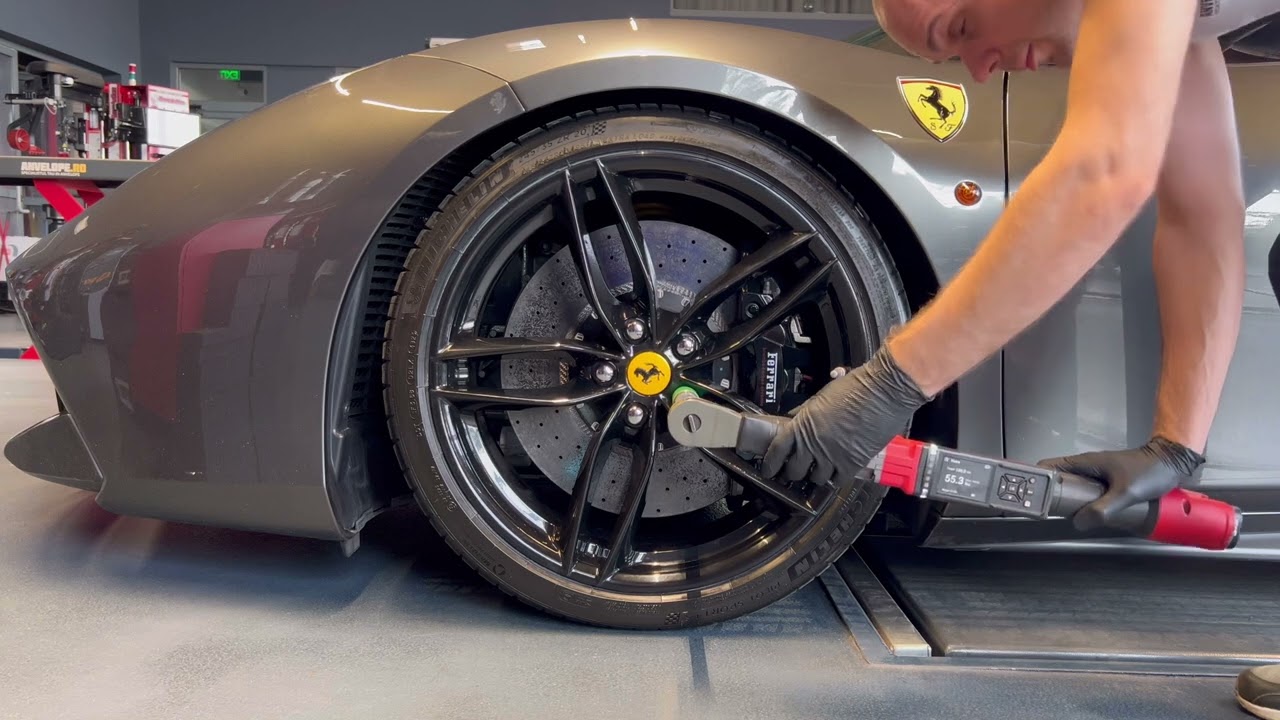 Using an Milwaukee M12 digital torque wrench on a Ferrari 488 GTB after tire change