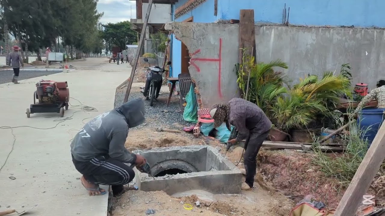 Breaking and Levelling Top Wall Manhole along Reinforced Concrete Pavement
