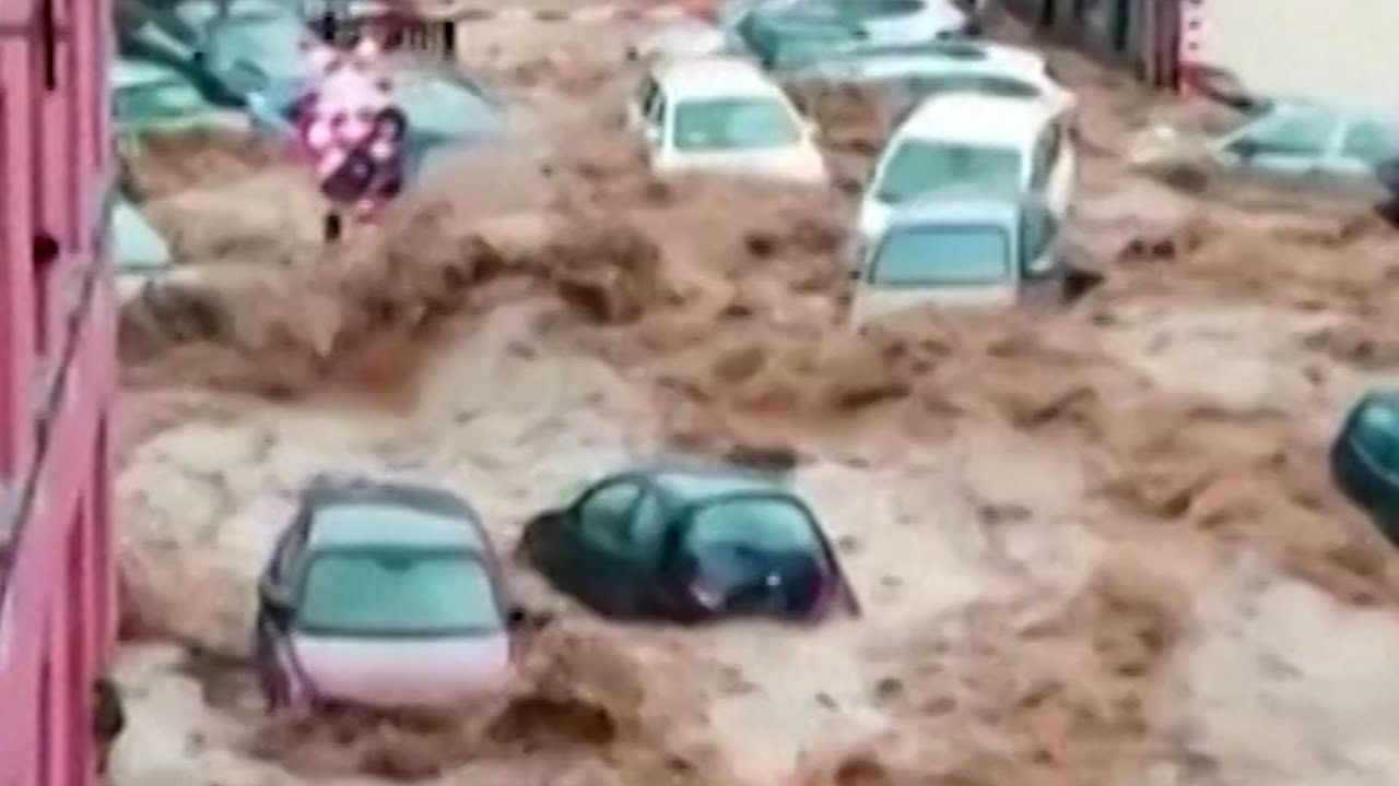 Severe flooding sweeps cars away in Belgium