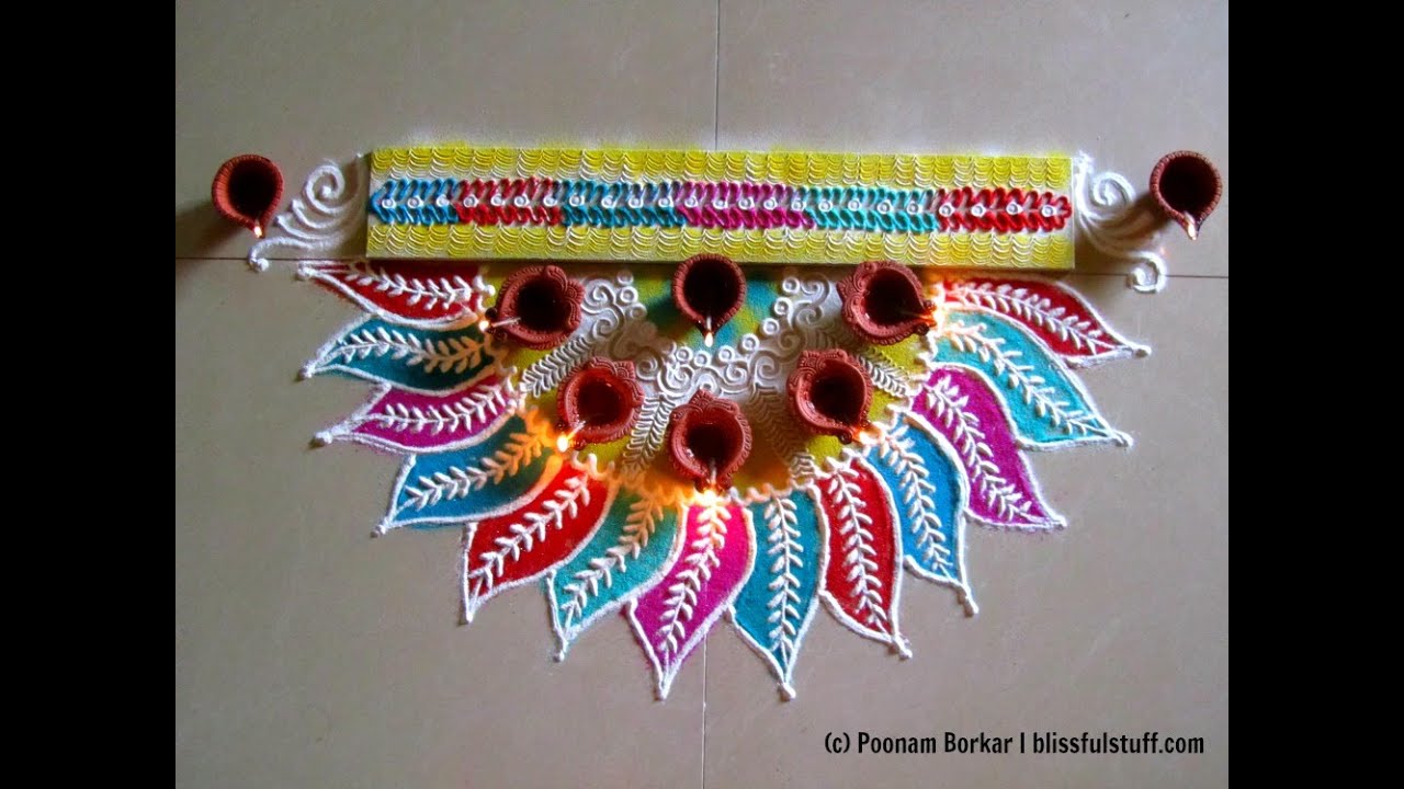 Innovative multicolored semi circle rangoli | Flower shaped rangoli by Poonam Borkar