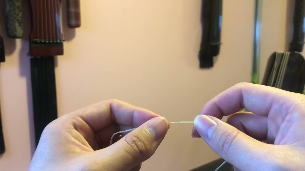 古琴打蝇头 tying a butterfly knot for guqin