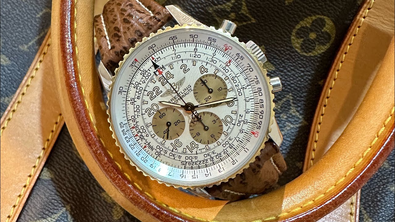 阿Lam講表-Breitling Navitimer Cosmonaute D12022 銀白面 金色計時圈 銀時標 條字 42MM  k金九牙圈 cal. 12手上鏈機芯 原裝皮帶原裝摺扣 有証