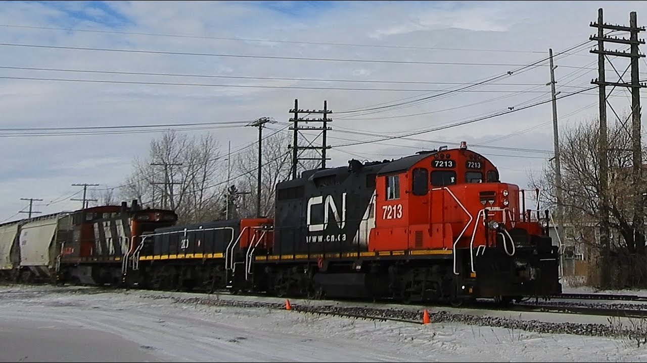 Mixed Freights, Passenger Train and GMD1 Power Sailing Along Cold Rails (02/14/2018)