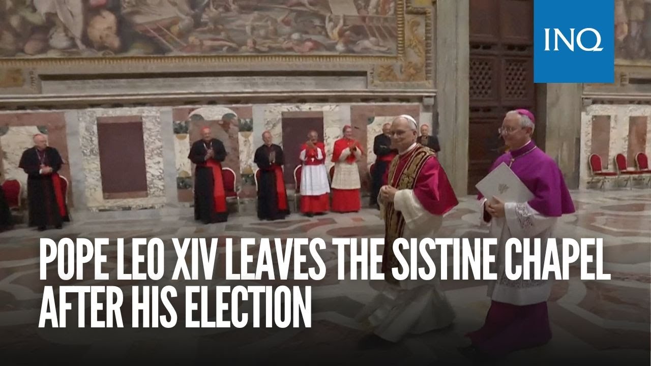 Pope Leo XIV leaves the Sistine Chapel after his election