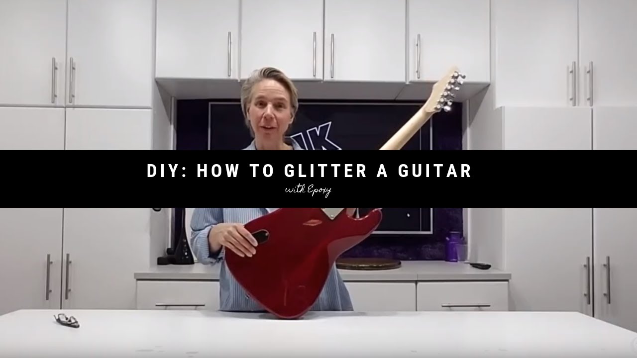 Red Glitter Guitar with Embedded Design