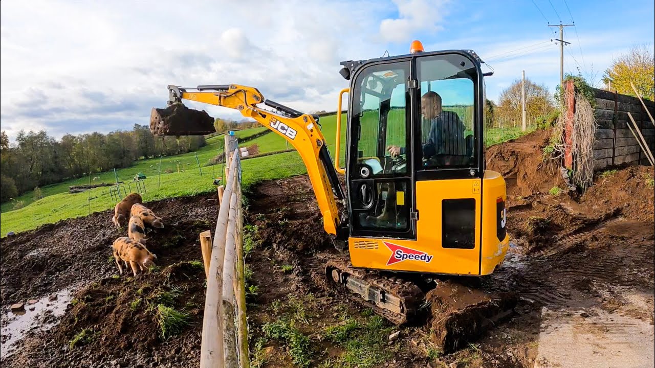 MINI DIGGER GETS THE JOB DONE - Beats a shovel!