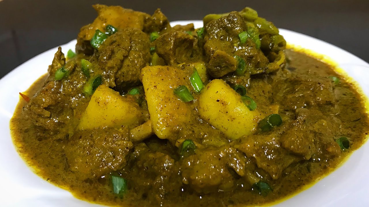 Curried Goat, cook in fresh coconut milk. Best tasting!