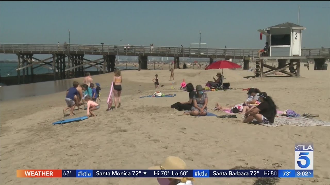 Californians mark July 4 weekend with closed bars, beaches