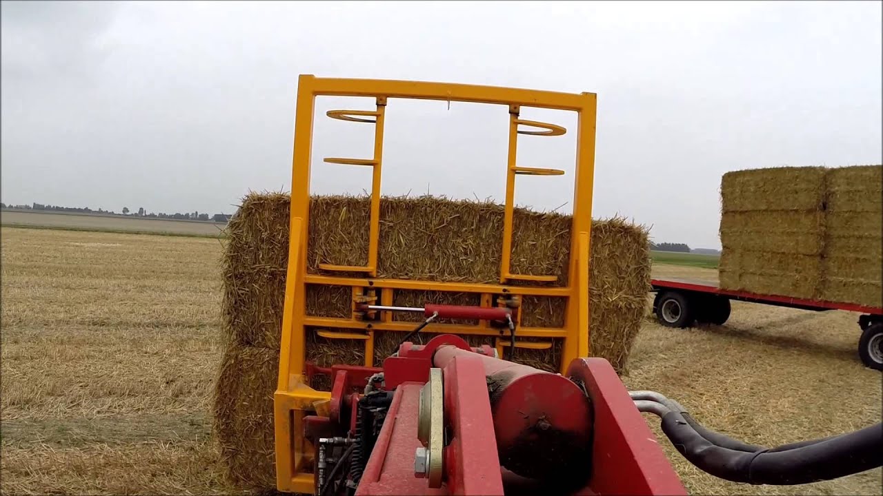 Loading straw bales with a Schaeffer 9330T teleloader (GoPro Hero3+)