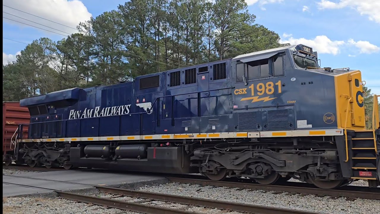 CSX M409 with 1981 Pan Am Railways Heritage Unit Leading 