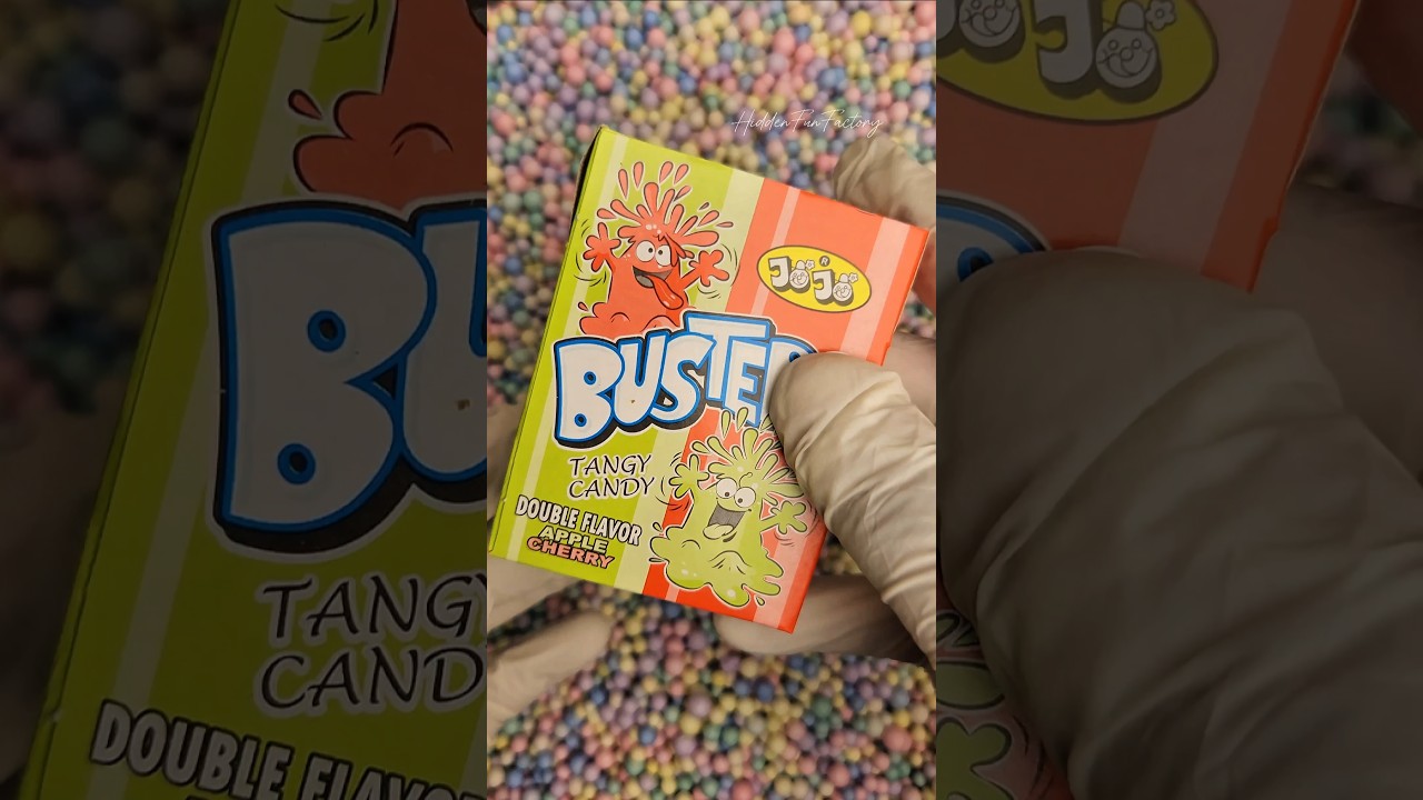 Unbox the tangy goodness of Buster's Double Flavor Candy &ndash; a sweet blend of Apple and Cherry! 🍏🍒
