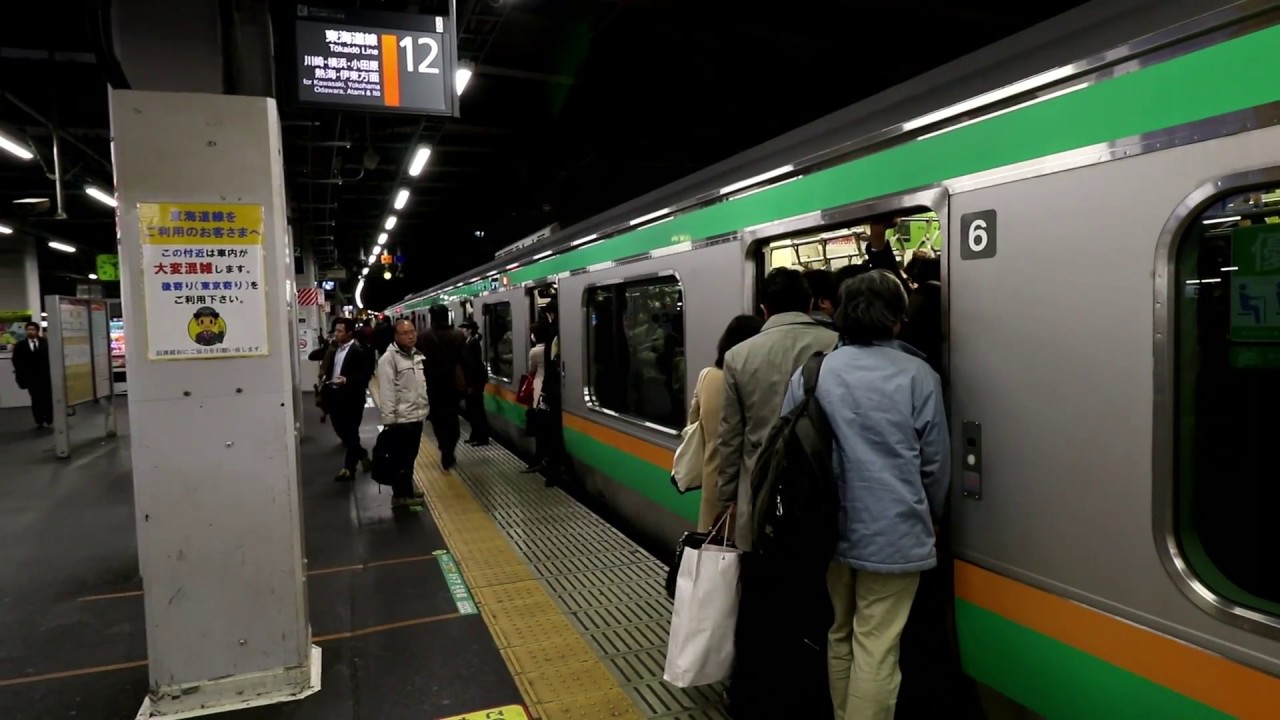 Japan Rail 'pushers' at Shinagawa Station, Tokyo