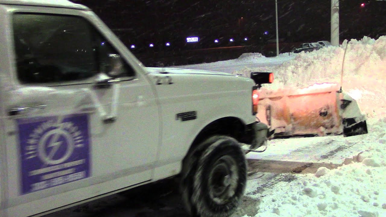 Using a Pickup Truck Snow Plow at the Sam's Club in Lone Tree, Colorado