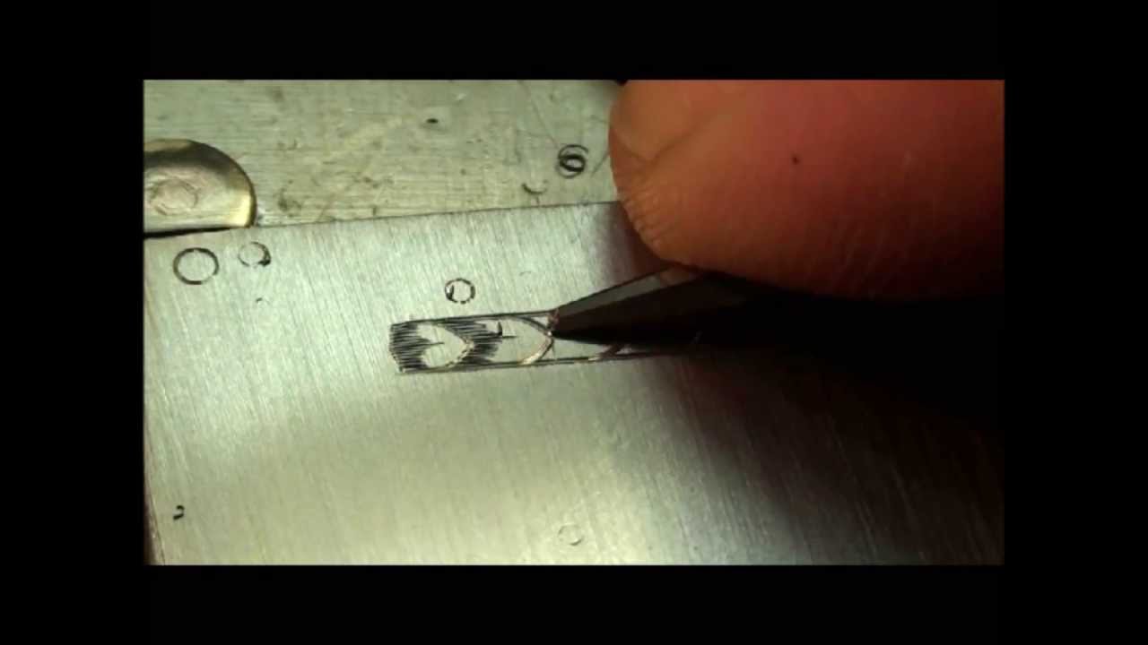 Jim Small Engraving a steel practice plate