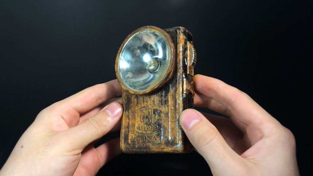 Restoring a Rusty Portable Lamp.  Restoration of a very old Flashlight