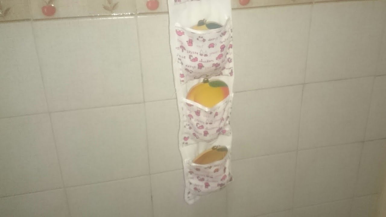 اصنعى بنفسك  حامل للادوية او منظم للاحزمة من جيبة قديمة ( اعمال يدوية )