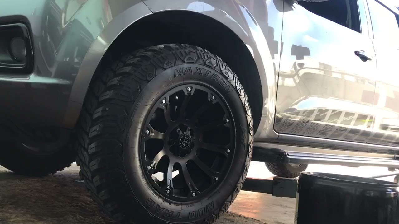 Установка комплекта для выравнивания Nissan Frontier