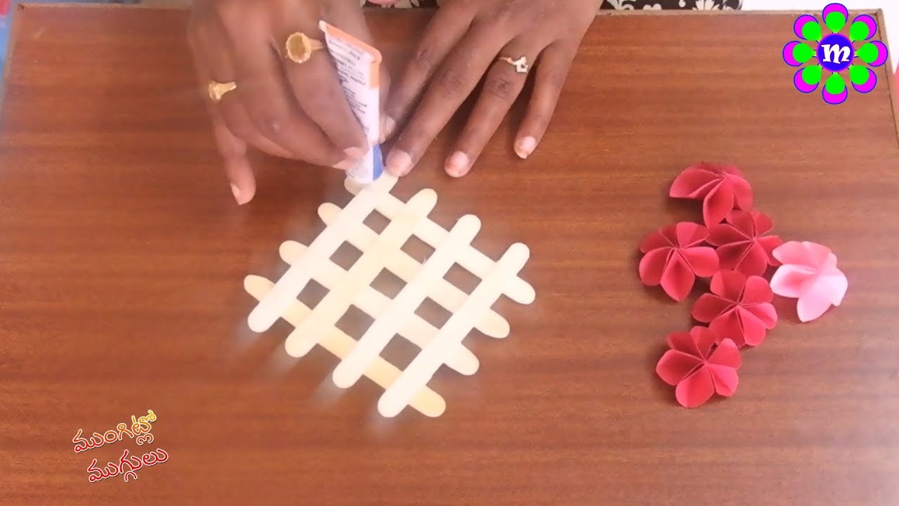 Paper Flower Wall Hanging with Ice cream sticks # Wall Decoration ideas# Komali Arts
