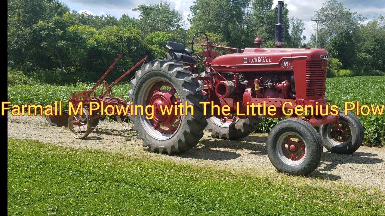 Farmall M Plowing with The Little Genius Plow