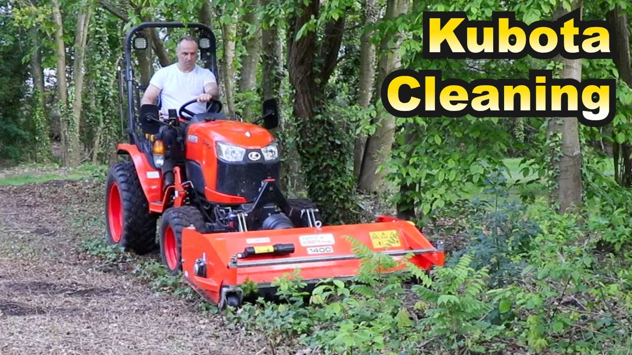 Outdoors clean up using a Kubota B2261 Compact Tractor and Front Flail Mower
