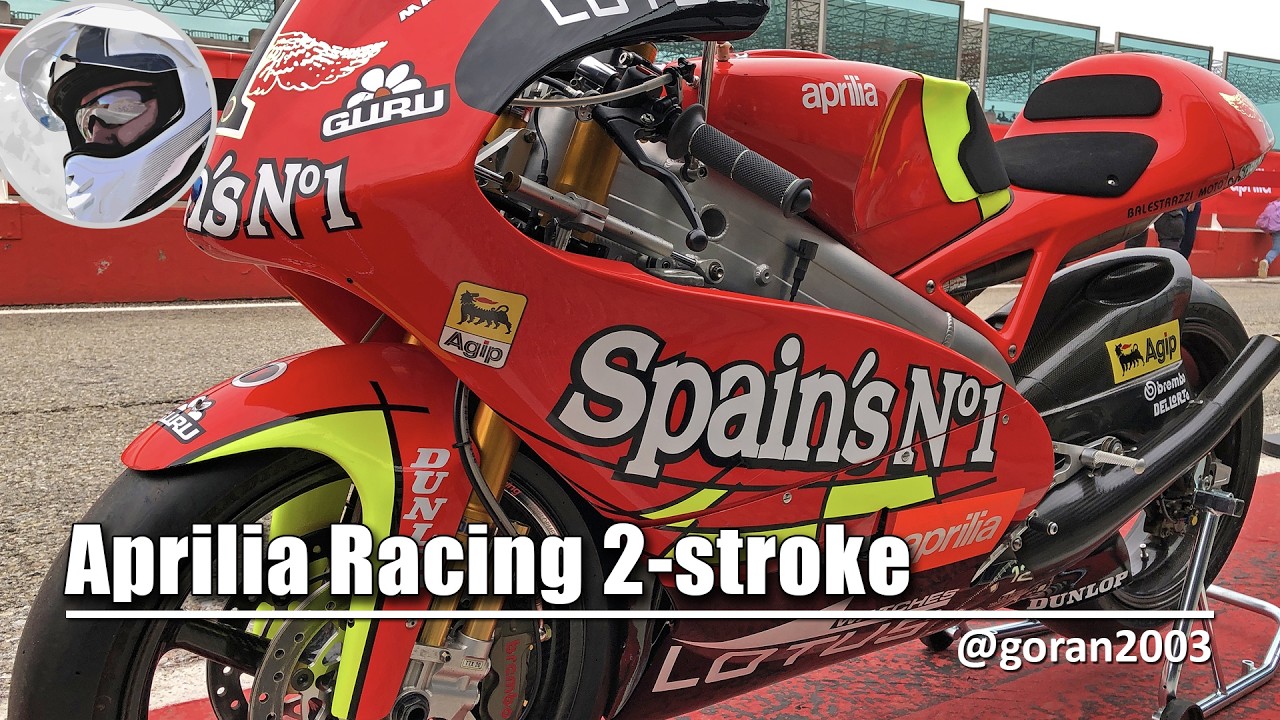 Aprilia Racing 2-stroke racing motorcycles on red carpet in Misano Adriatico