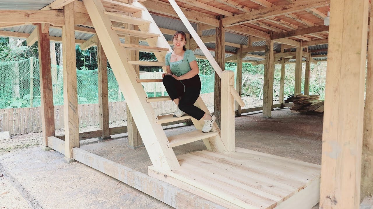 Install the wooden house stairs in the forest to the second floor and ask your sister to help