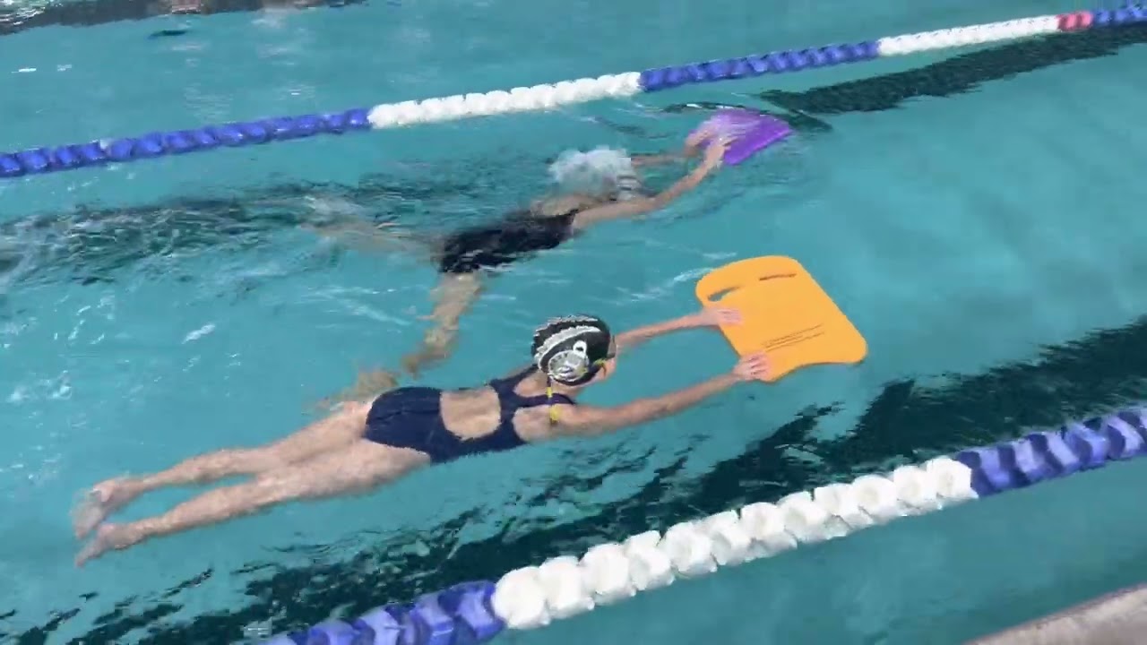 Breaststroke Drill - 1 breath, 1 kick, glide 3 seconds with a board