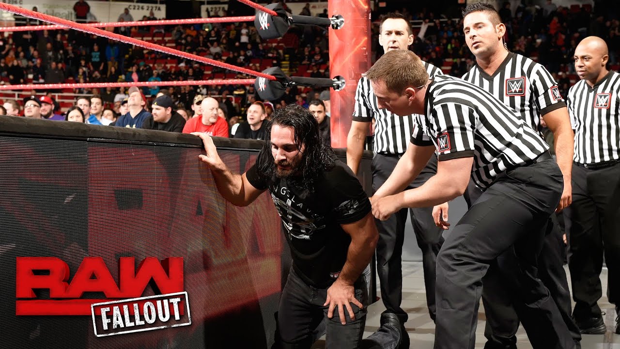 Seth Rollins is helped out of the arena after his encounter with Triple H: Raw Fallout, Mar 13, 2017