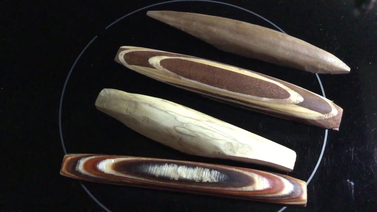 Four wooden rattlebacks (anagyre, celt, chembongo)
