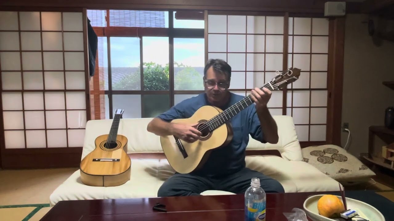 Two Cypress guitars