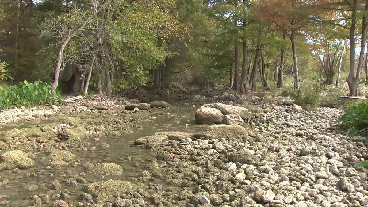 Lake Dunlap is full again, but downstream neighbors say they’re now drying out