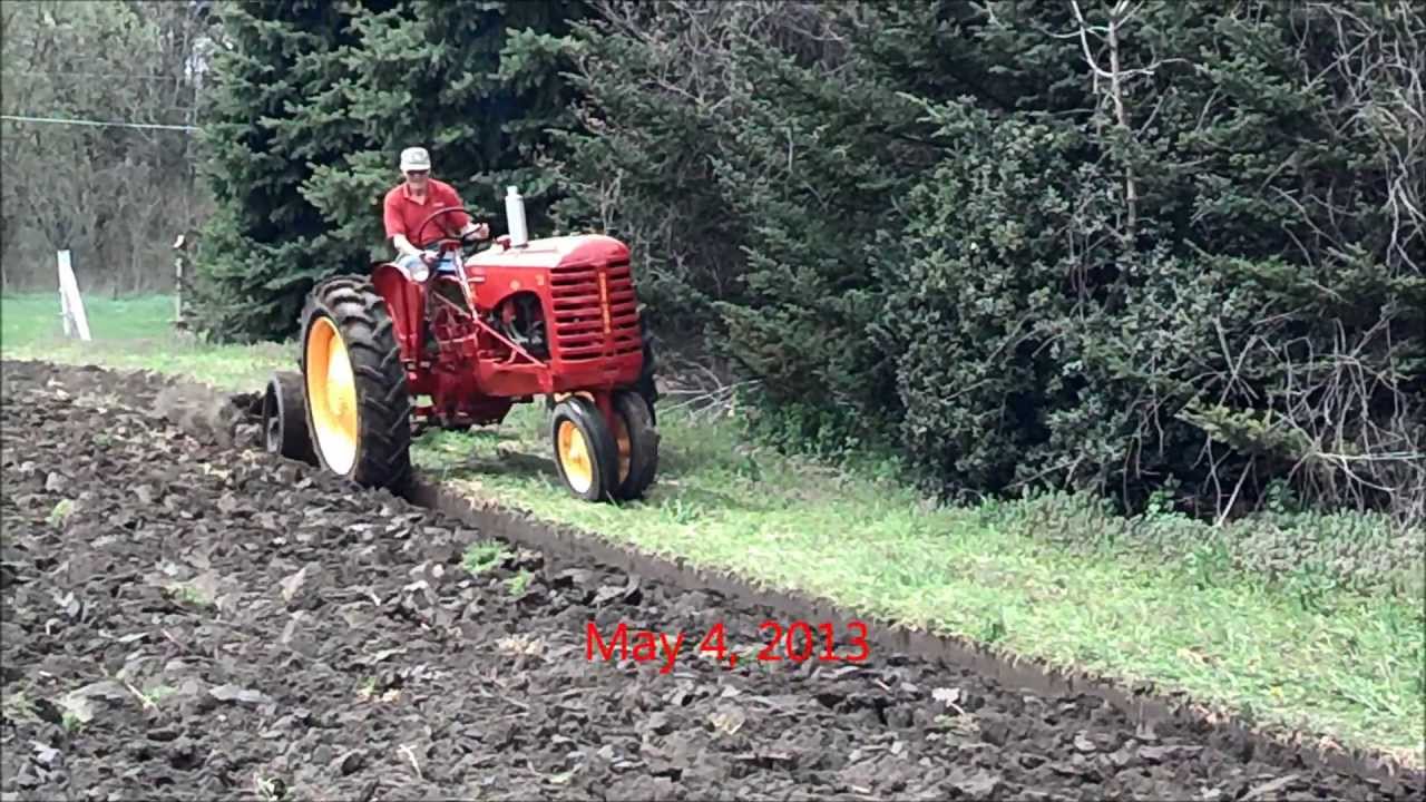 1953 Massey Harris 33 plowing with MH 2 bottom trip plow